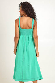 Model Pamelar wearing size 10 of the Essentials Strappy Linen Blend Dress - Green in colour Green, from the back