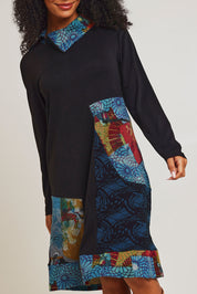 Model Ziara wearing size 10 of the Billie Jean Patch Pockets Dress in colour Billiejean (Black), from the front, cropped image