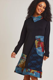 Model Ziara wearing size 10 of the Billie Jean Patch Pockets Dress in colour Billiejean (Black), from the front, cropped image
