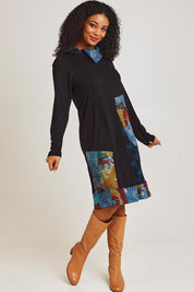 Model Ziara wearing size 10 of the Billie Jean Patch Pockets Dress in colour Billiejean (Black), from the front, showing the whole outfit