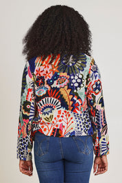 Model Ziara wearing size 10 of the Hotel California Velvet Cross Front Jacket in colour California, from the back