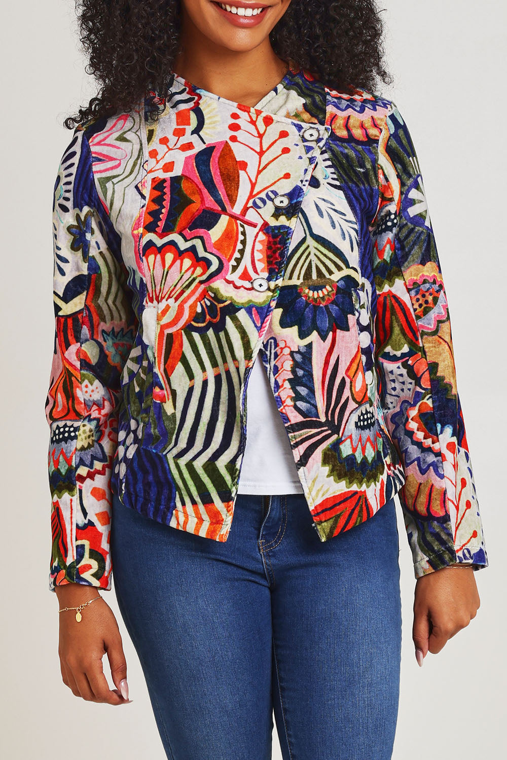 Model Ziara wearing size 10 of the Hotel California Velvet Cross Front Jacket in colour California, from the front, cropped image