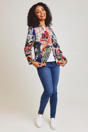 Model Ziara wearing size 10 of the Hotel California Velvet Cross Front Jacket in colour California, from the front, showing the whole outfit