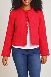 Model Ziara wearing size 10 of the Chanel Cotton Coat in colour Red (Red), from the front, cropped image