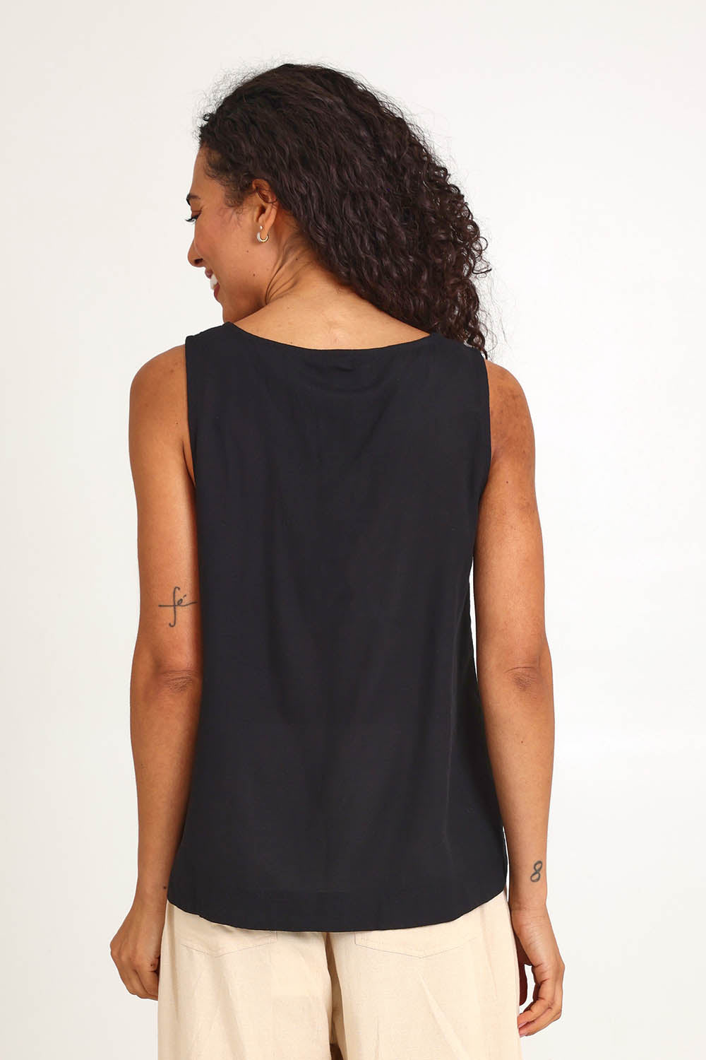 Model Pamelar wearing size 10 of the Essentials Linen Blend Cami - Black in colour Black, from the back