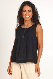 Model Pamelar wearing size 10 of the Essentials Linen Blend Cami - Black in colour Black, in a cropped view