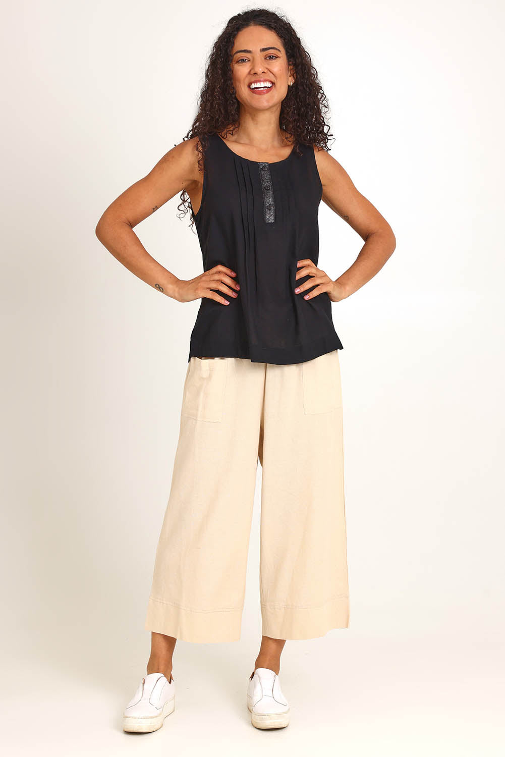 Model Pamelar wearing size 10 of the Essentials Linen Blend Cami - Black in colour Black, from the front