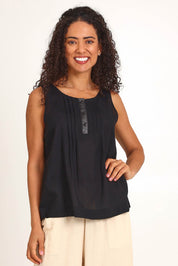 Model Pamelar wearing size 10 of the Essentials Linen Blend Cami - Black in colour Black, from the front