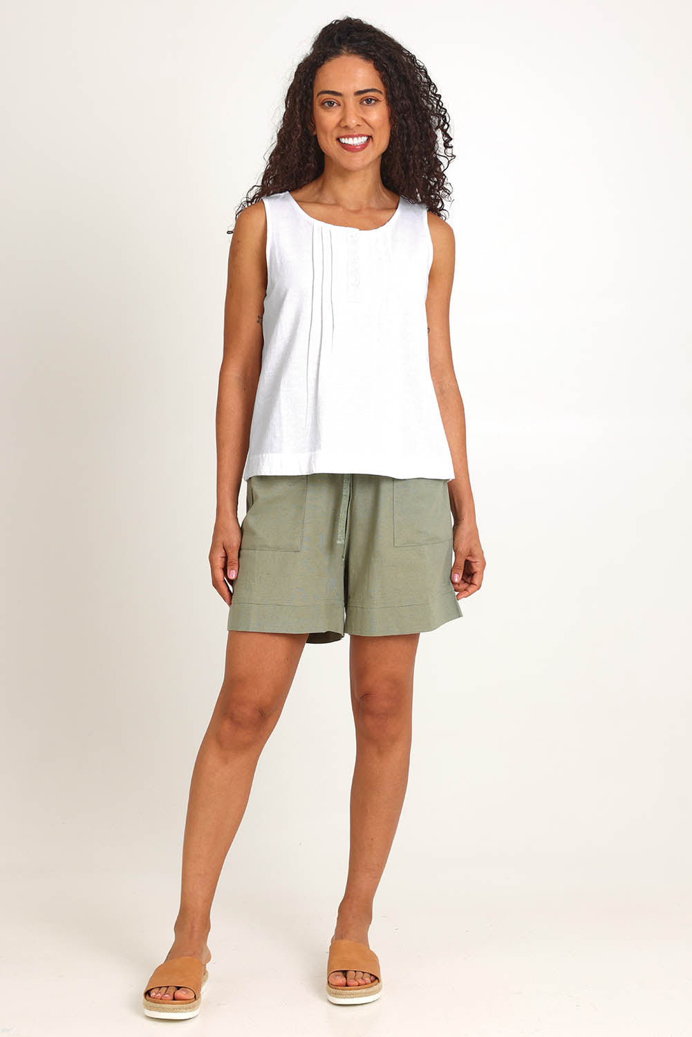 Model Pamelar wearing size 10 of the Essentials Linen Blend Cami - White in colour White, from the front