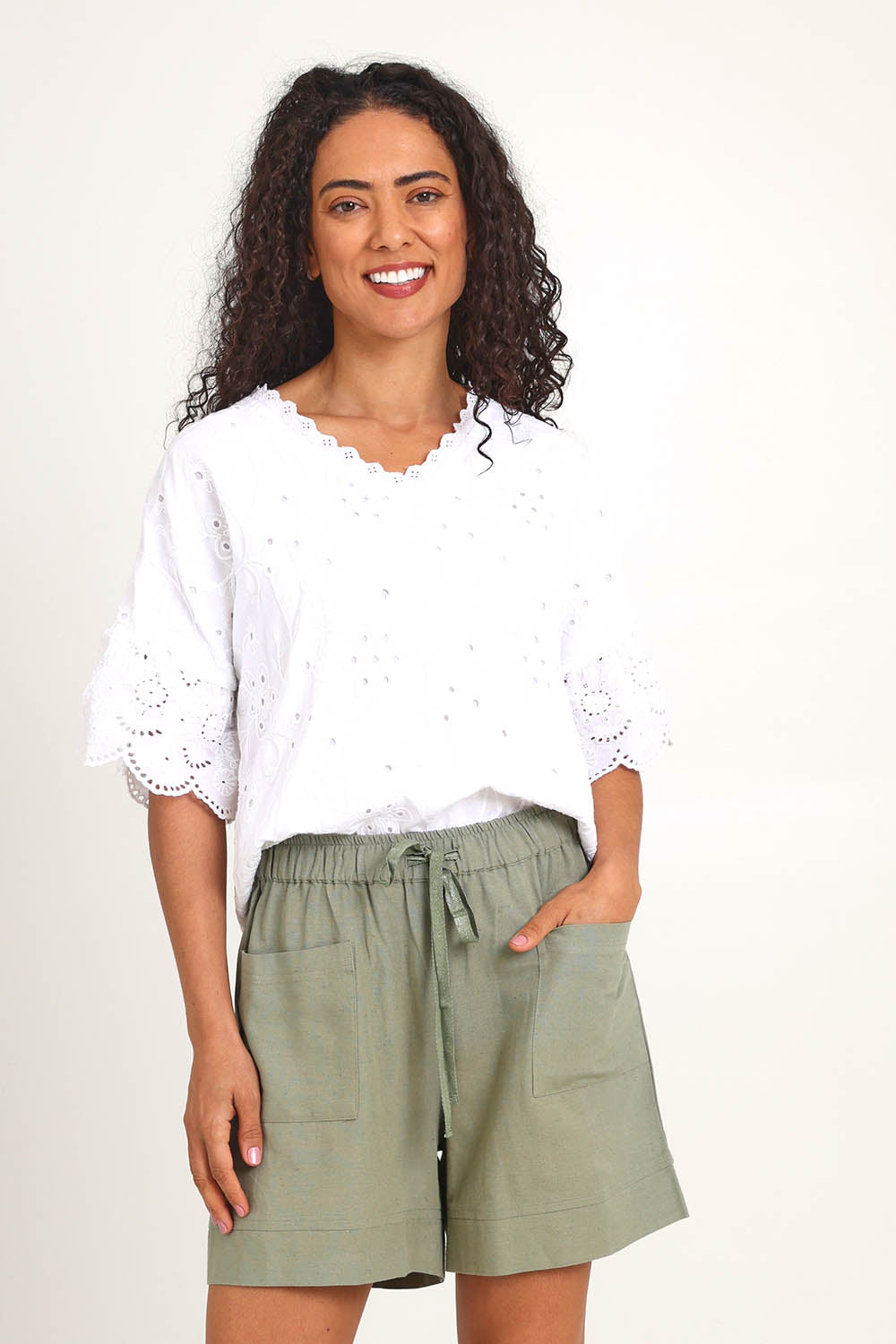 Model Pamelar wearing size 10 of the Essentials Linen Blend Shorts - Khaki in colour Khaki, in a cropped view