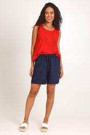 Model Pamelar wearing size 10 of the Essentials Linen Blend Shorts - Navy in colour Navy, from the front