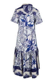 Product shot of the Long Patch Cotton Dress – Print in colour Print, from the back