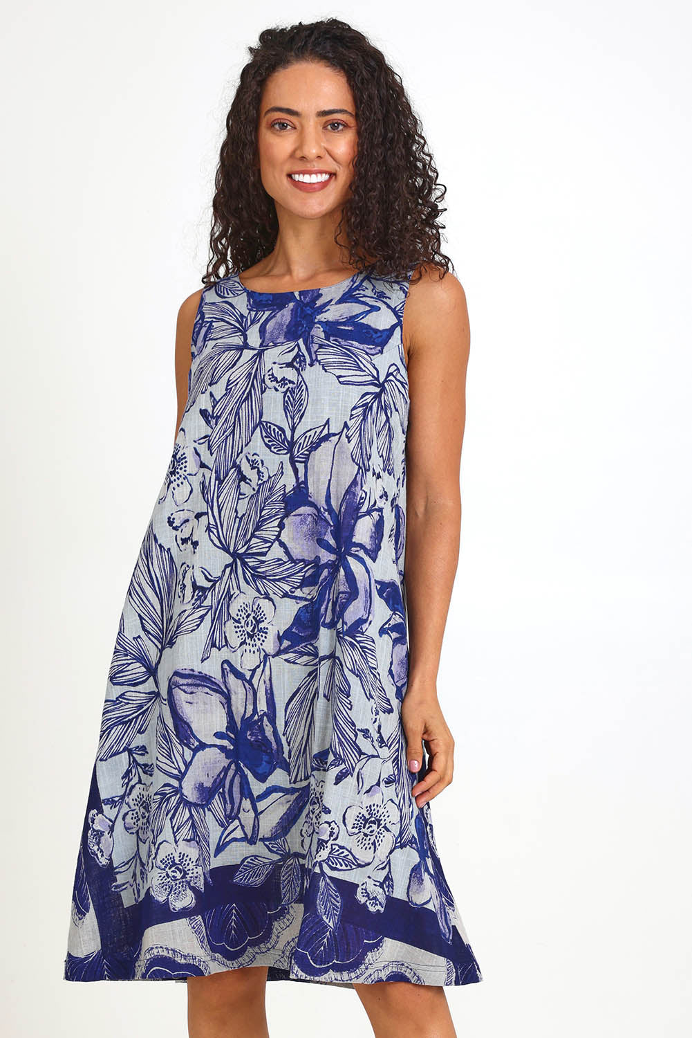 Model Pamelar wearing size 10 of the Sleeveless Midi Dress – Print in colour Print, in a cropped view