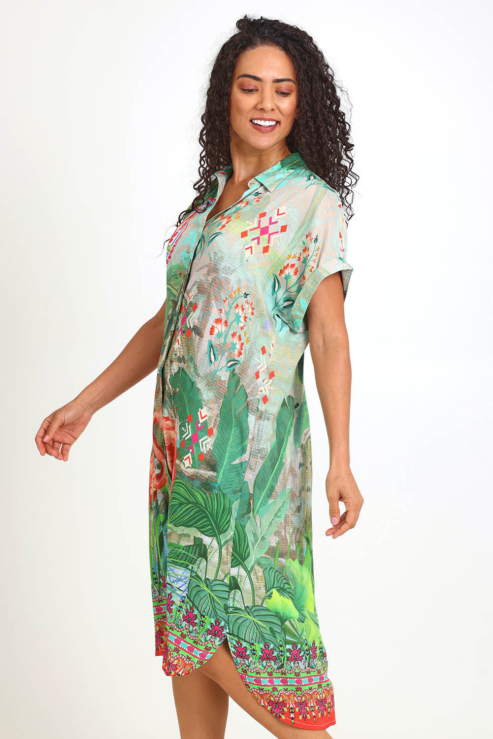 Model Pamelar wearing size 10 of the Collar Shirt Dress – Flamengo in colour Flamengo, from an angle