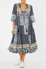 Model Rachel wearing size 10 of the Ramatuelle Organic Cotton Print Dress in colour Print (Blue), from the front, cropped image