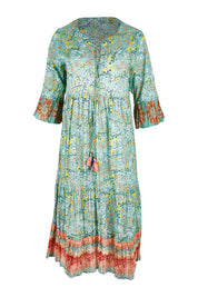 Product shot of the Chania 3/4 Sleeve Layers Dress in colour Print (Green), from the front