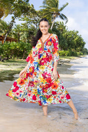 A model wearing the La Pelosa Maxi V Neckline Trim Dress in colour Print (Red), from the front, showing the whole outfit
