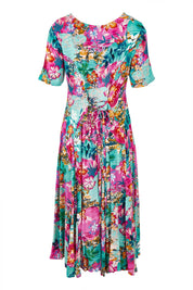 Product shot of the Short Sleeve Godet Dress in colour Selaron, from the back