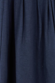 Product shot of the Esssential Knits Yoke Pleated Dress in colour Navy (Blue), from the front