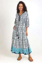 Model Pamelar wearing size 10 of the V Maxi Dress – Print in colour Print, from the front