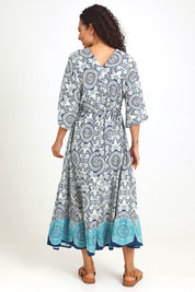 Model Pamelar wearing size 10 of the V Maxi Dress – Print in colour Print, from the front