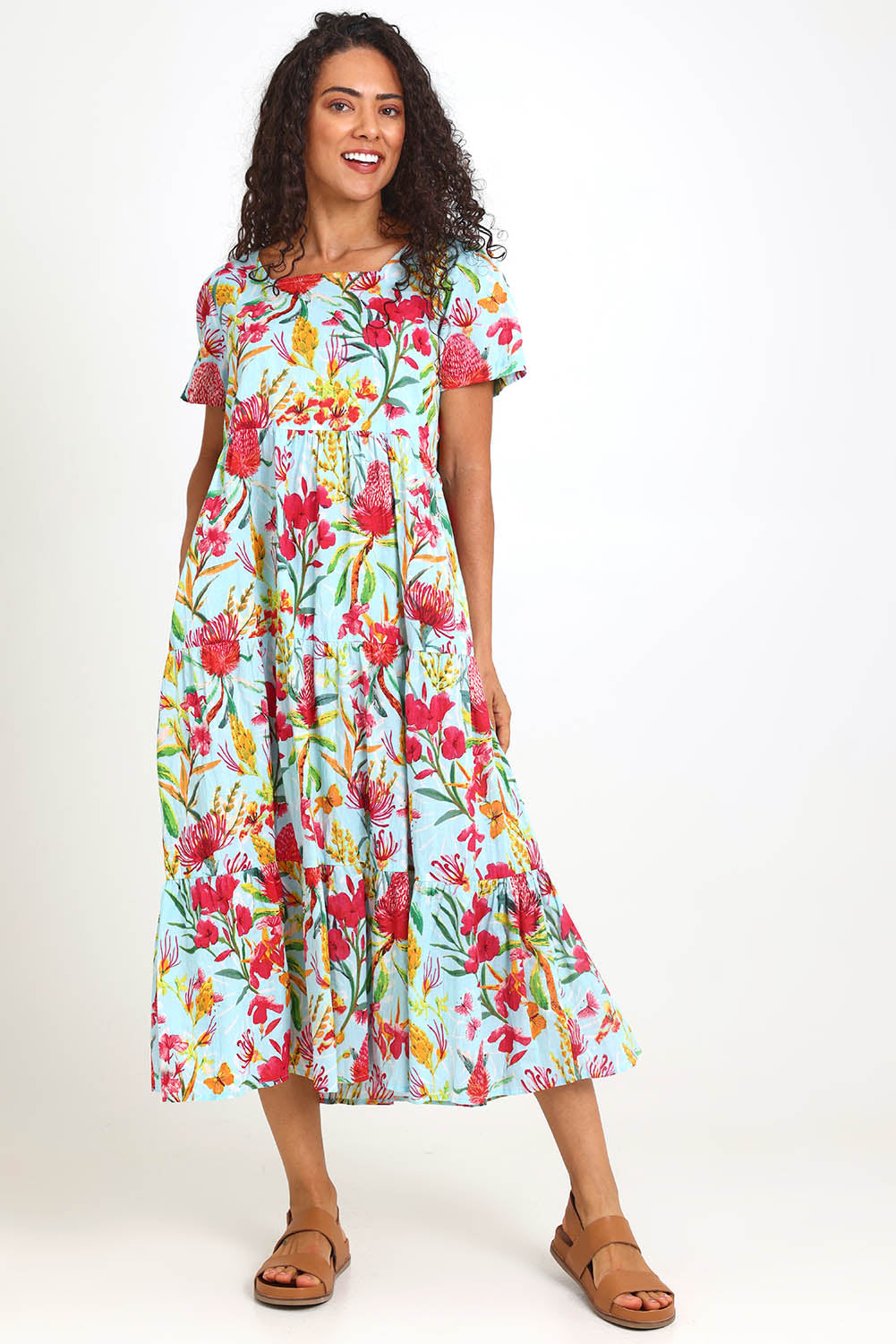 Model Pamelar wearing size 10 of the Square Neckline  Midi Dress – Print in colour Print, from the front