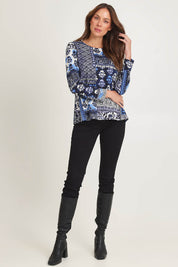 Model Madeline wearing size 10 of the Contemporary Tee in colour Bhadoi (Blue), from the front, showing the whole outfit