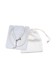Product shot of the Healing Gems Classics Necklace - Pearl in colour Pearl, showing detail