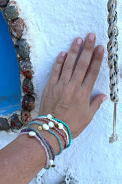 Product shot of the Luna Pearl Bracelet - Aventurine in colour Aventurine, from the back
