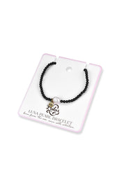 Product shot of the Luna Pearl Bracelet - Onyx in colour Onyx, from the back