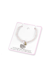 Product shot of the Luna Pearl Bracelet - Pearl in colour Pearl, from the back