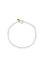 Product shot of the Luna Pearl Bracelet - Pearl in colour Pearl, from the front