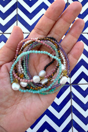 Product shot of the Luna Pearl Bracelet - Turquoise in colour Turquoise, from the back