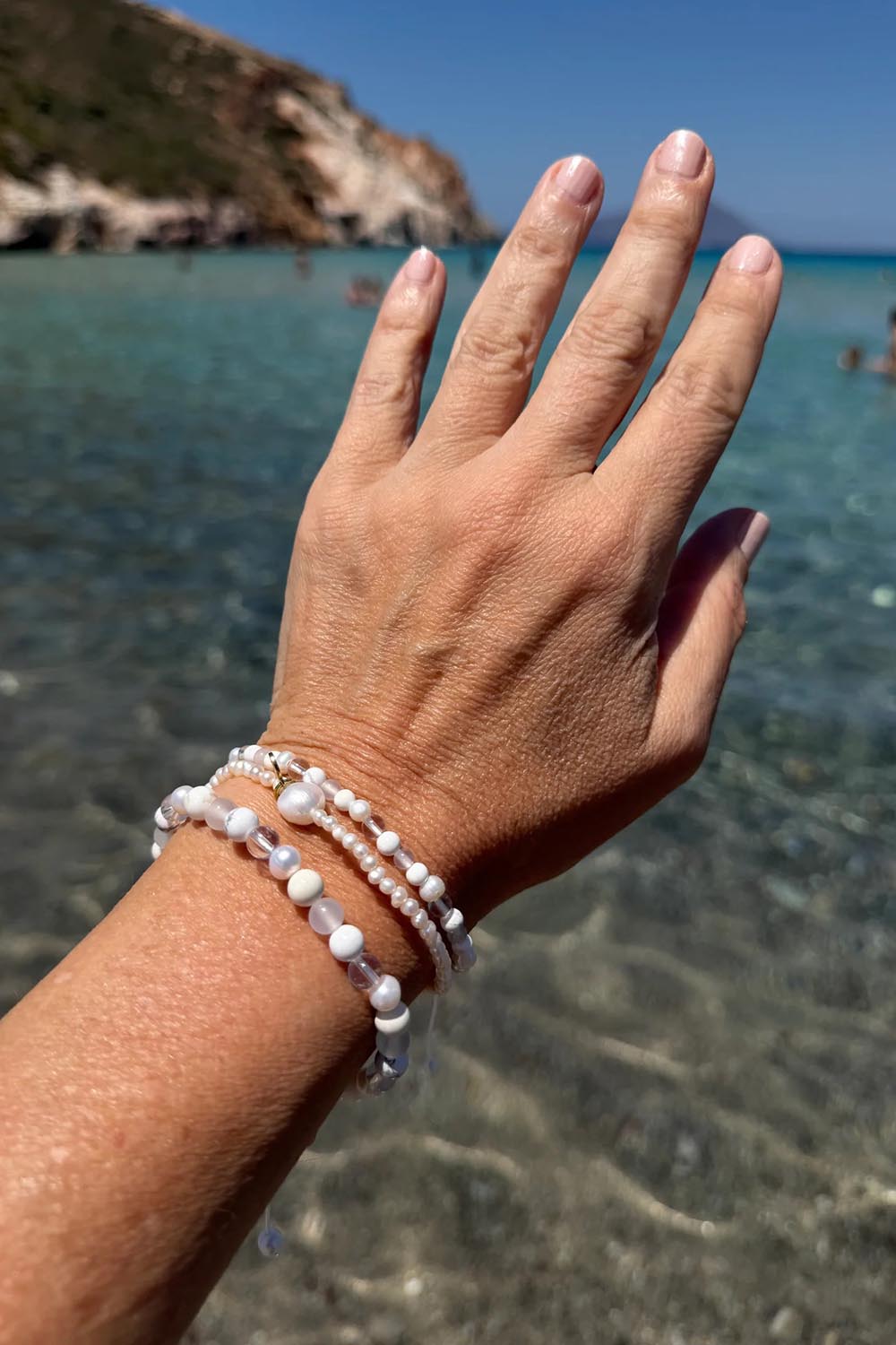 Product shot of the Spirit Stones Medium Bead Bracelet - Pearl in colour Pearl, from the front