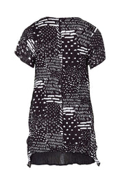 Product shot of the Cotton Crinkle Top in colour Blackprint (Black), from the back