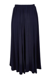 Product shot of the Adeline Bamboo Skirt in colour Navy (Blue), from the back