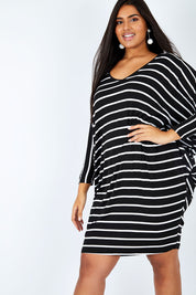 Model Shanaya wearing size OneSize of the Long Sleeve Stripe Miracle Dress in colour BlackWhite (Black), from the front, cropped image