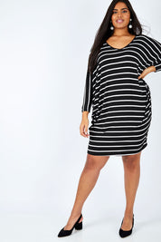 Model Shanaya wearing size OneSize of the Long Sleeve Stripe Miracle Dress in colour BlackWhite (Black), from the front, showing the whole outfit