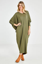 Model Kelly wearing size OneSize of the Long Sleeve Maxi Miracle Dress in colour Khaki (Green), from the front, showing the whole outfit