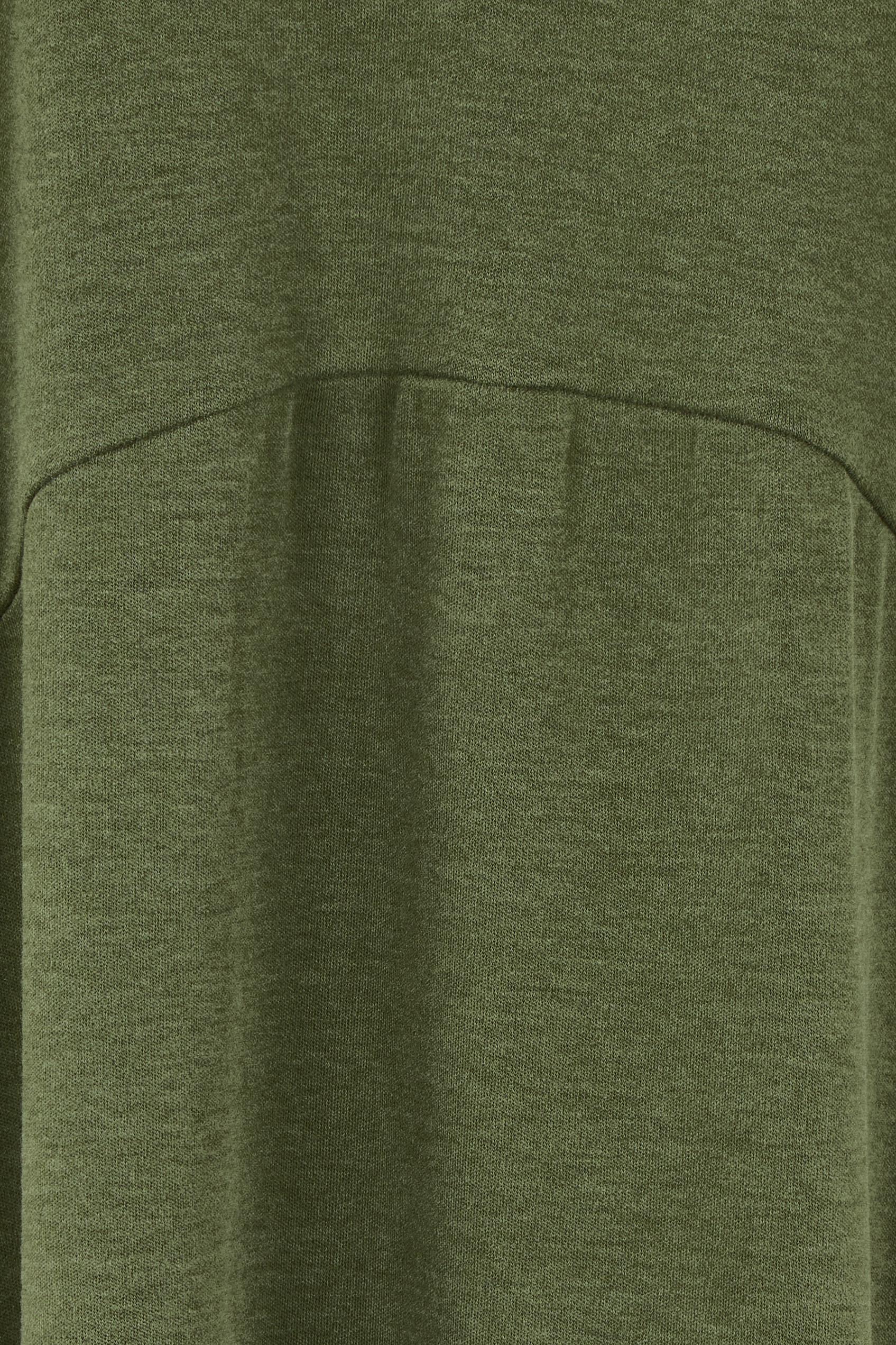 Product shot of the Alviva Lounge Dress in colour Fern (Green), detail