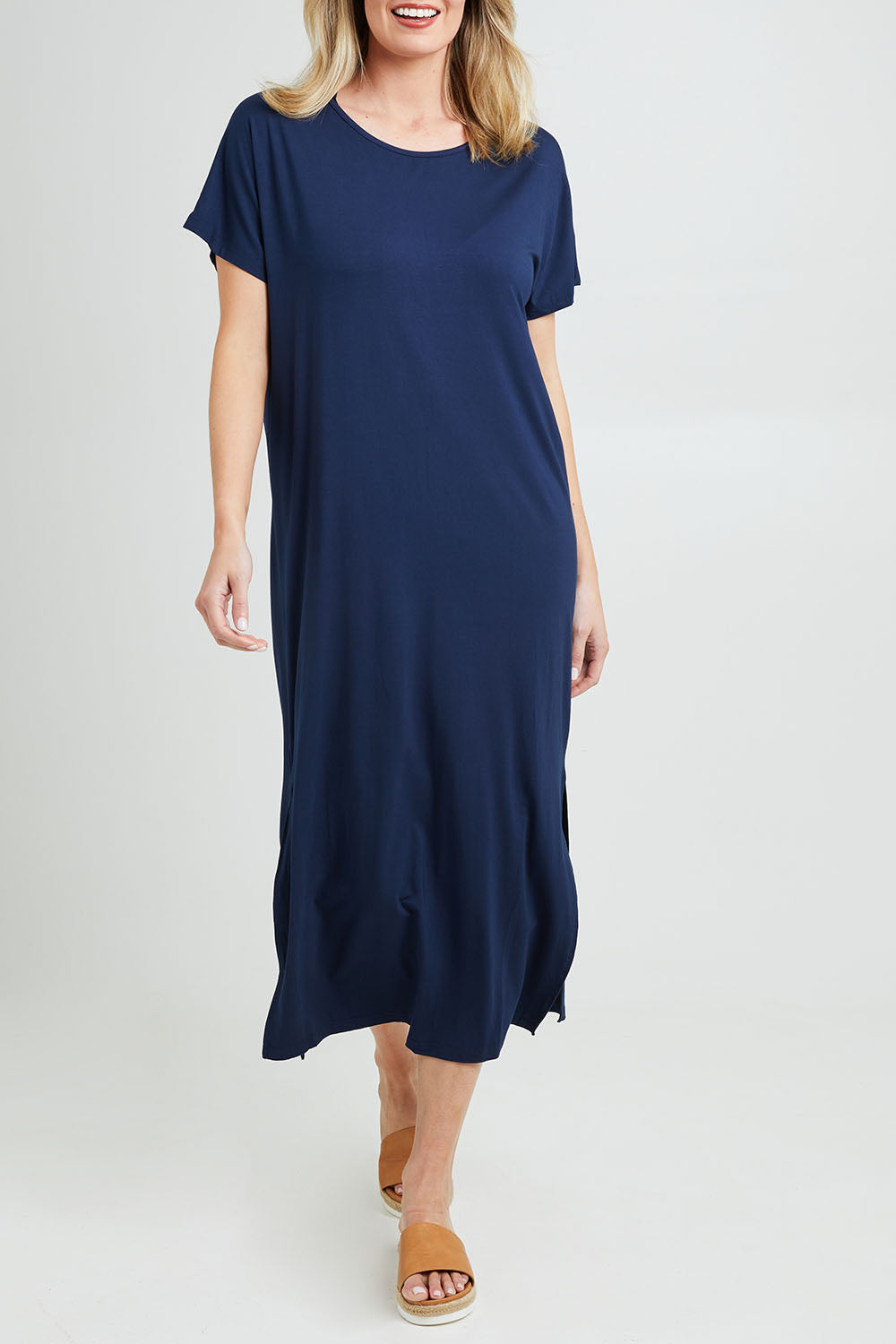 Model Grace wearing the Destiny Round Neck Dress in colour Navy (Blue), from the front, cropped image