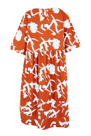 Product shot of the Kingsley Cotton Dress in colour Myrtle, from the back