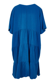 Product shot of the Chic Cotton Dress in colour Ultramarin (Blue), from the back
