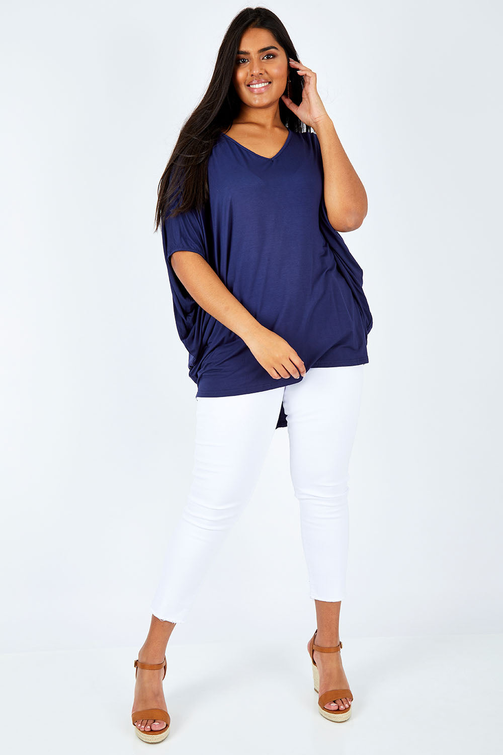 Model Shanaya wearing size OneSize of the Hi Low Top in colour Navy (Blue), from the front, showing the whole outfit