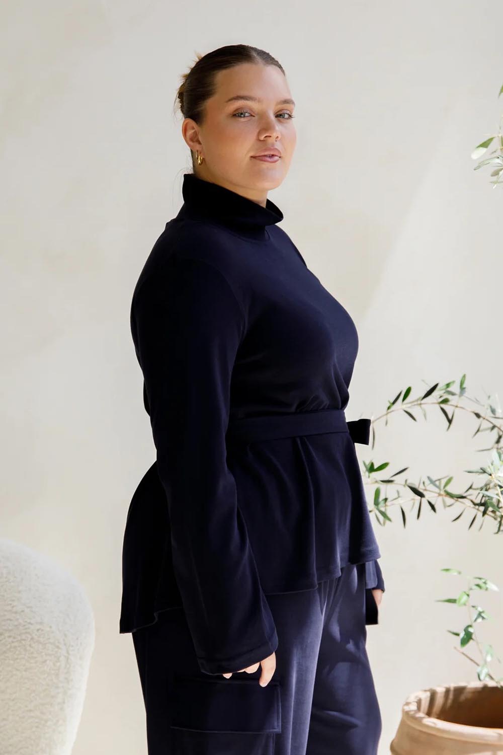 A model wearing the Jazmine Cotton Blend Top in colour Midnight (Blue), from the front, cropped image