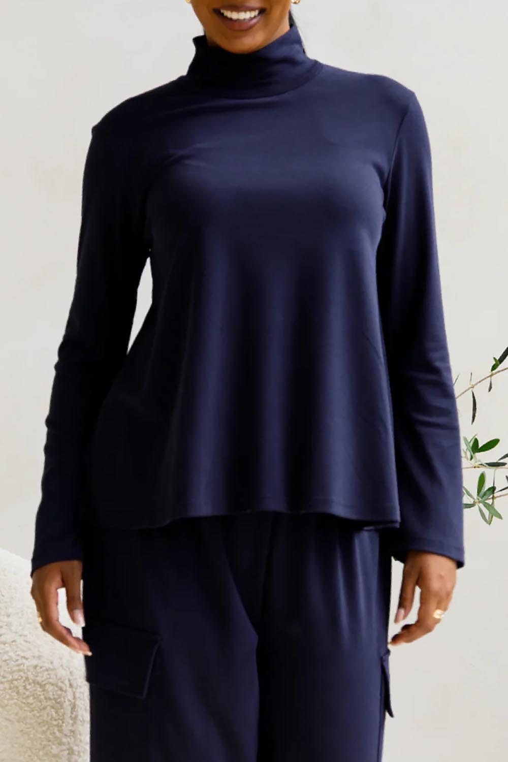A model wearing the Jazmine Cotton Blend Top in colour Midnight (Blue), from the front, cropped image
