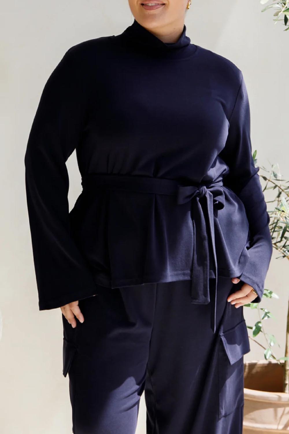 A model wearing the Jazmine Cotton Blend Top in colour Midnight (Blue), from the front, cropped image