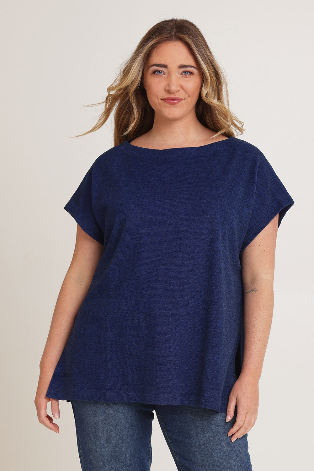 Model Chanel wearing size XL of the Bridget Top in colour Ocean (Blue), from the front, cropped image