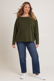 Model Chanel wearing size XL of the Pennie Long Sleeve Top in colour Fern (Green), from the front, showing the whole outfit