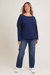Model Chanel wearing size XL of the Pennie Long Sleeve Top in colour Ocean (Blue), from the front, showing the whole outfit